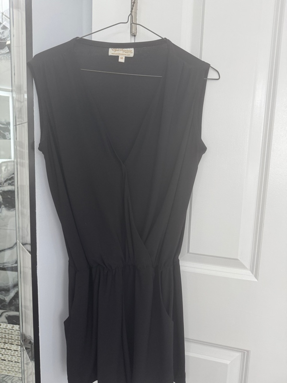 Anthropologie Black Sleeveless Faux-Wrap Romper with Pockets and Elastic Waist